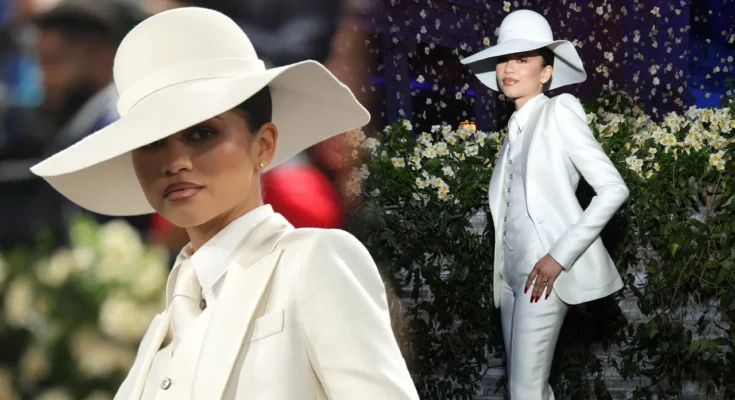 https://www.etonline.com/media/videos/met-gala-2025-zendaya-channels-diana-ross-and-bianca-jagger-in-all-white-suit-235251